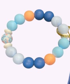 Wristlet met siliconen kralen in blauw en marble oranje met leren kwastje – stijlvolle pols sleutelhanger.