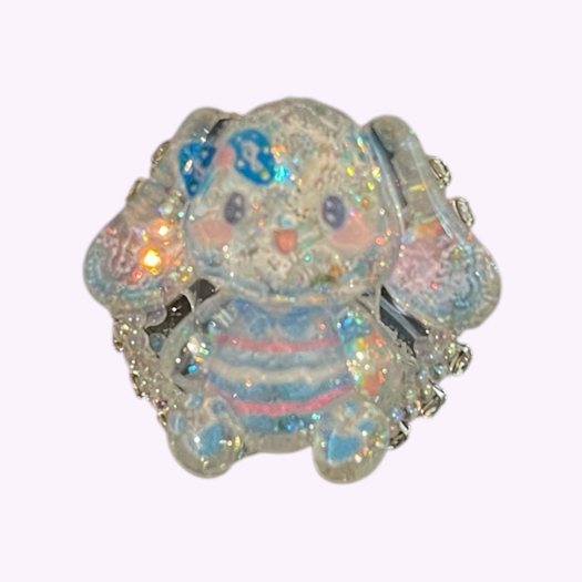 Glinsterende siliconen kraal van een blauw-roze olifantenfiguurtje met, strik en glitterdetails – perfect voor kawaii sleutelhangers of DIY pennen