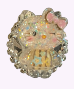 Schattige glitterende kat met knipoog, roze strik en sterretjes op haar kleding – siliconen kraal met strassrand voor creatieve projecten