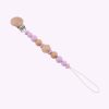 Speenkoord van siliconen en hout in lila tinten – babyveilig accessoire met houten clip en kralen